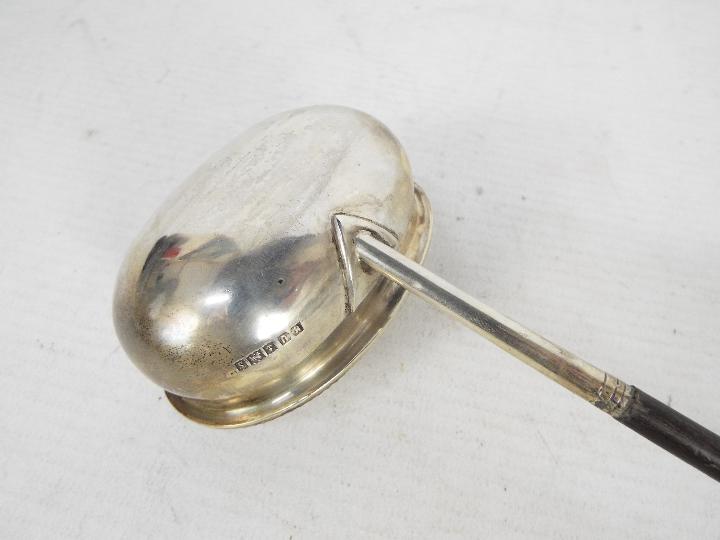 A silver toddy ladle, 35 cm (l) Condition Report: Generally good condition, - Image 4 of 5