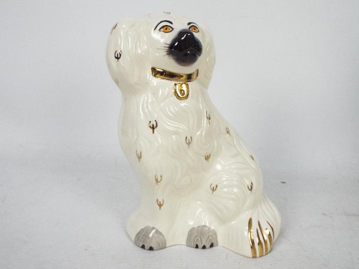 A boxed pair of Royal Doulton Staffordshire style seated spaniels, approximately 19 cm (h). - Image 2 of 8