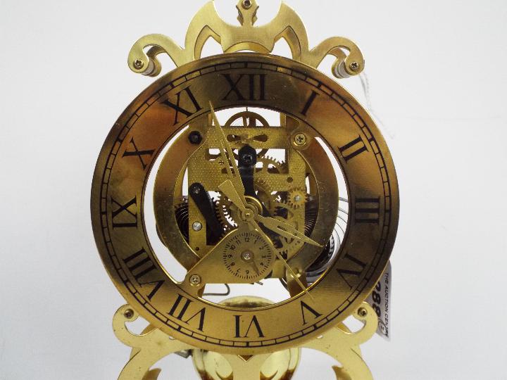 An oak cased mantel clock and a brass skeleton clock. - Image 6 of 8