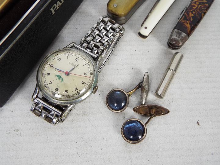 A mixed lot of collectables to include white metal hip flask, penknives, wrist watch, - Image 3 of 7