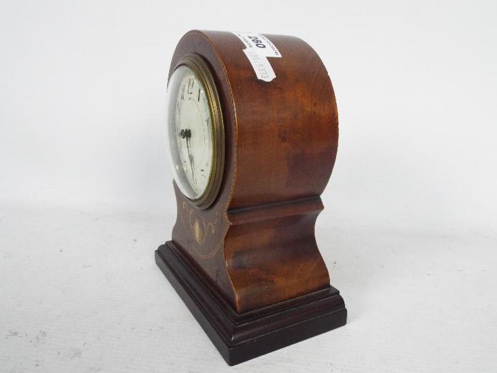 A French, inlaid mahogany, balloon shaped mantel clock, Arabic numerals to a white dial, with key, - Image 3 of 5