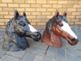 Two painted, reconstituted stone, horse head garden ornaments, approximately 48 cm (h).