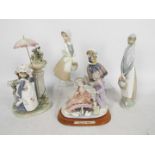 A collection of Lladro and similar figur