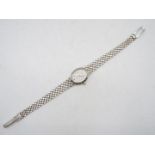 A lady's 9ct white gold wrist watch and