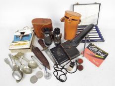 A mixed lot to include binoculars, cased