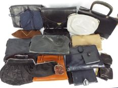 A collection of lady's handbags and purses.