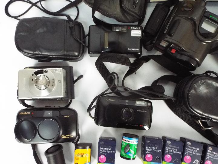 Lot to include cameras comprising Olympus, Canon and Minolta, a portable DVD player, - Image 2 of 4