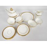 Royal Doulton - A quantity of tea wares in the Royal Gold pattern, # H4980 comprising five trios,