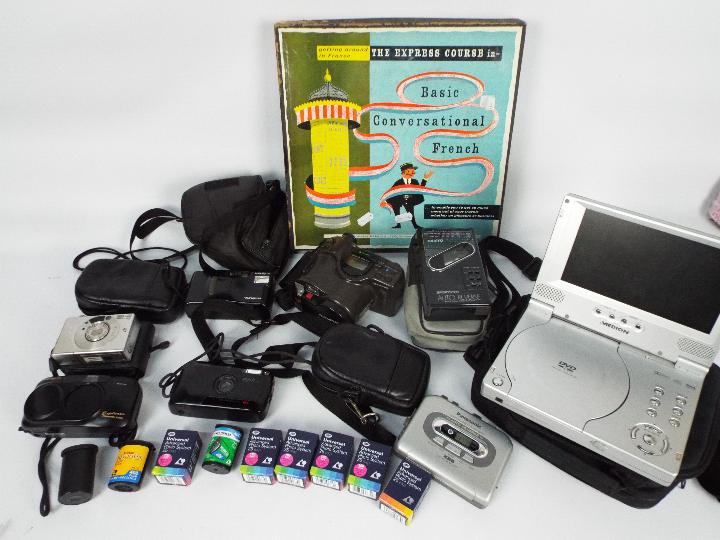 Lot to include cameras comprising Olympus, Canon and Minolta, a portable DVD player,