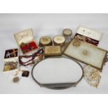 A quantity of dressing table items and a collection of costume jewellery.