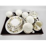 A collection of Wedgwood tea wares with floral and foliate decoration, 23 pieces.