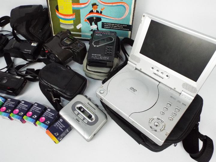 Lot to include cameras comprising Olympus, Canon and Minolta, a portable DVD player, - Image 4 of 4