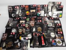 Halloween - Thirty two sealed packs of Smiffys make up FX to include glow in the dark skeleton,