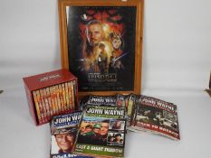 A quantity of The Classic John Wayne Collection DVDs and periodicals and a framed Star Wars Phantom