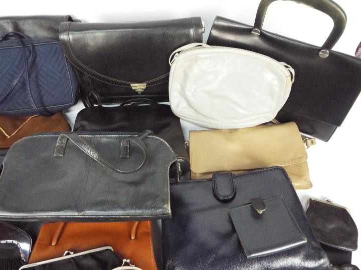 A collection of lady's handbags and purses. - Image 3 of 4