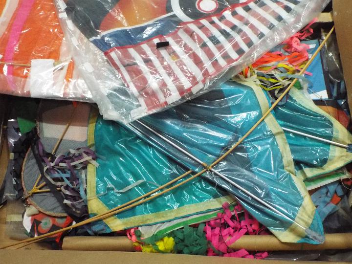 A large quantity of kites and accessories to include flat kites, delta kites, lines, - Image 5 of 6