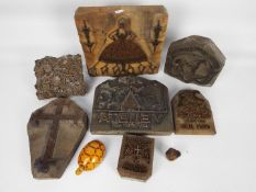 A collection of vintage printing blocks.