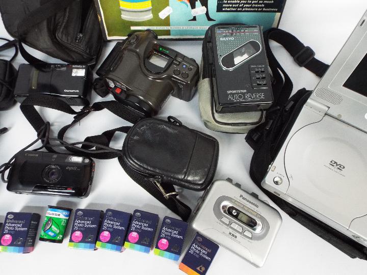 Lot to include cameras comprising Olympus, Canon and Minolta, a portable DVD player, - Image 3 of 4