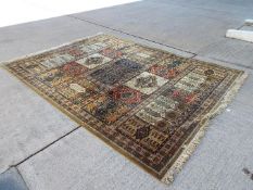 A large carpet measuring approximately 380 cm x 270 cm