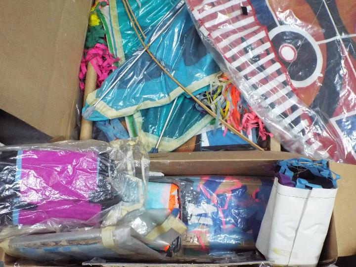 A large quantity of kites and accessories to include flat kites, delta kites, lines, - Image 4 of 6