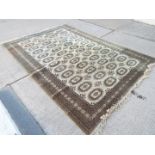 A large Belgian carpet measuring approximately 370 cm x 250 cm