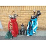 A collection of golf clubs and accessori