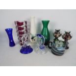 A collection of glassware, largest piece