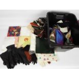 A quantity of lady's accessories to include silk and similar scarves, gloves and other.