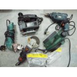 A collection of power tools to include d