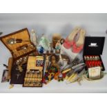 A mixed lot to include plated ware, ceramics, religious items, pair of boxed Kurt Geiger shoes,