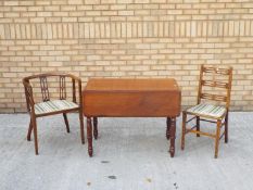 A drop leaf table measuring approximately 71 cm x 95 cm x 55 cm (105 cm) and two chairs.