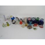 A collection of various paperweights, part boxed.