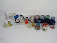 A collection of various paperweights, part boxed.