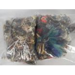 Costume Jewellery - Two clear, sealed bags of unsorted costume jewellery, approximately 10kg.