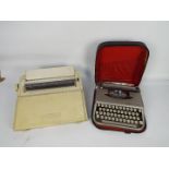 A Brother electric typewriter and an Empire Corona portable typewriter in carry case.