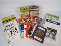 A mixed lot of national and regional football annuals and fanzines.