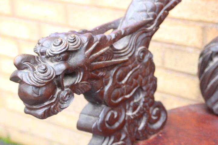 A profusely carved Chinese Dragon chair, carved dragon arms, phoenix to the backrest, - Image 2 of 4