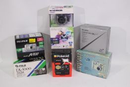 Photography - A collection of boxed cameras to include Fujifilm, Vivitar and similar.