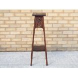 A mahogany plant stand, approximately 91 cm (h).