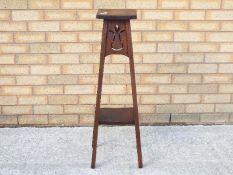 A mahogany plant stand, approximately 91 cm (h).