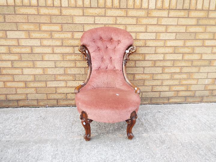 An upholstered nursing chair.