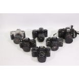 Photography - A collection of cameras to include two Praktica BMS Electronic, a Nikon F301,