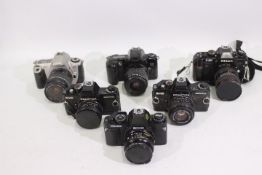 Photography - A collection of cameras to include two Praktica BMS Electronic, a Nikon F301,