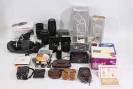 Photography - A collection of accessories to include lenses, filters, flash and similar.