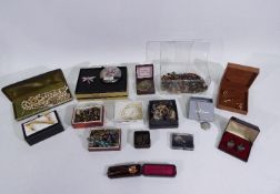 A collection of costume jewellery to include brooches, necklaces, cufflinks and similar.