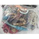 Costume Jewellery - Two clear, sealed bags of unsorted costume jewellery, approximately 9kg.