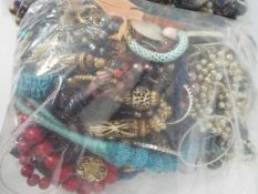 Costume Jewellery - Two clear, sealed bags of unsorted costume jewellery, approximately 9kg.