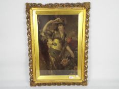A gilt framed print depicting a lady in
