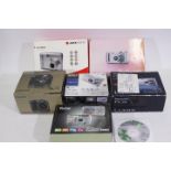 Photography - A collection of boxed digital cameras to include Fujifilm, Canon, Sony and similar.