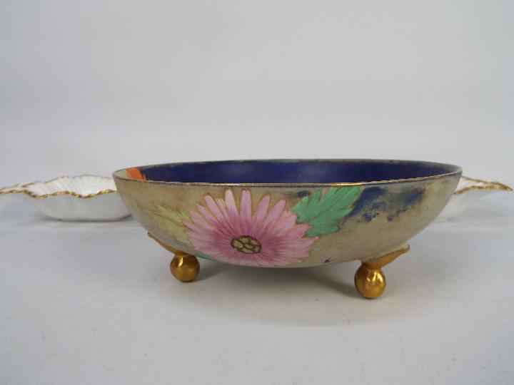 A Carlton Ware shallow bowl with floral decoration, raised on tripod, gilt, ball and claw supports, - Image 2 of 4